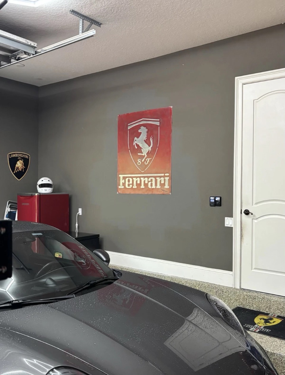 Ferrari sign installed in a customer garage